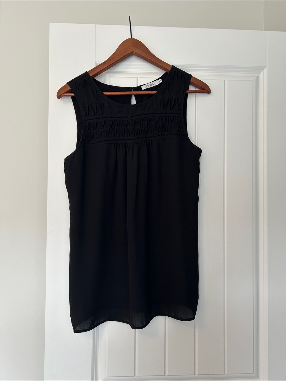 Ricki's Black Sleeveless Smocked blouse